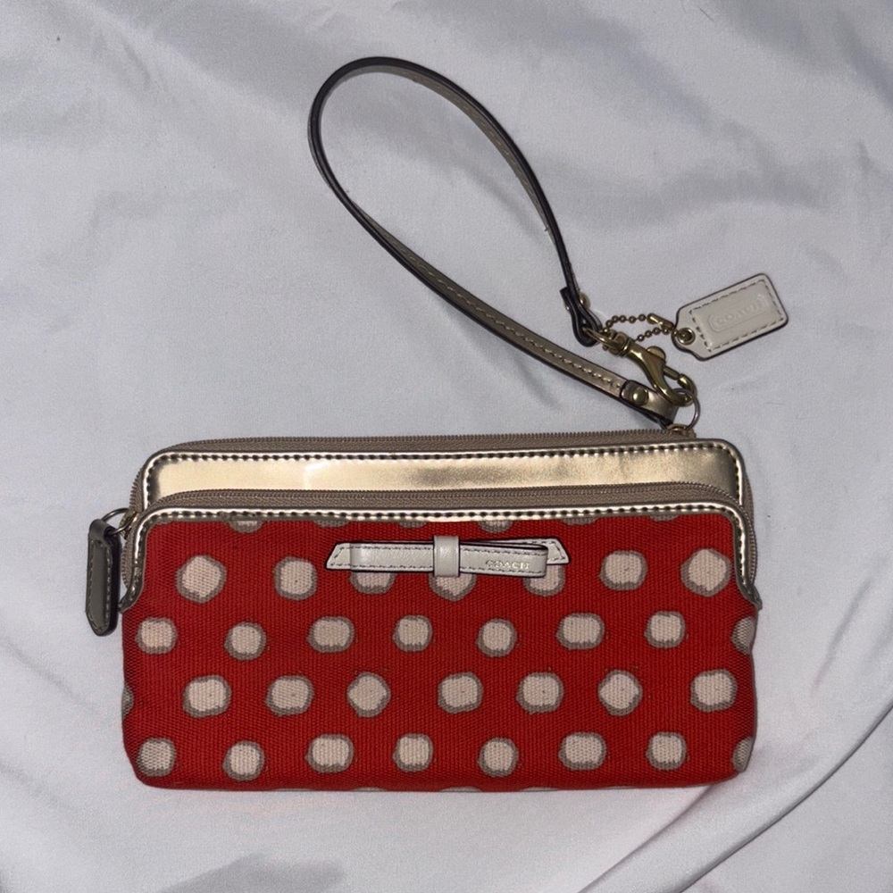 Coach orange and cream Wristlet Clutch
